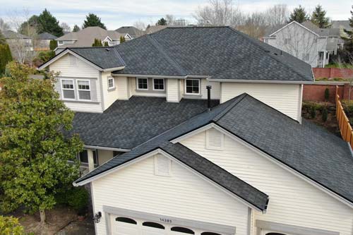 white house siding with dark shingles