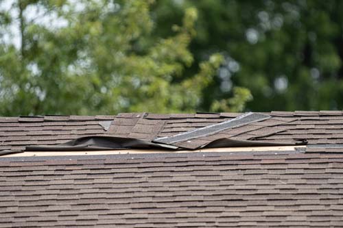 wind damaged shingles